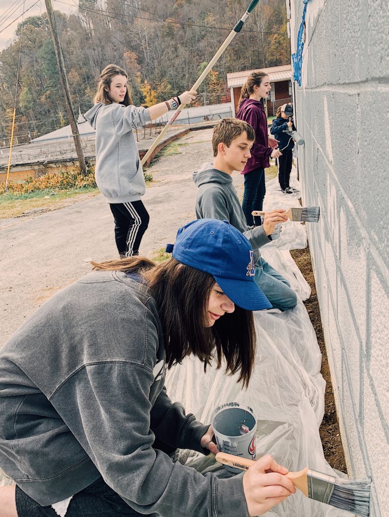 Junior High students mission trip painting